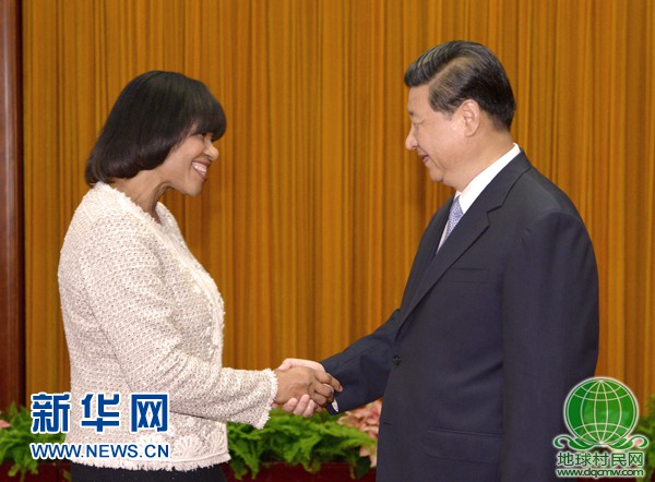 8月22日，国家主席习近平在北京人民大会堂会见牙买加总理辛普森-米勒。 新华社记者 马占成