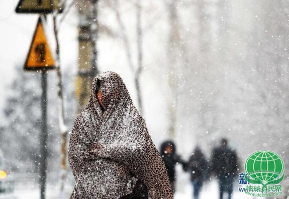 组图:我国南北天气冰火两重天 南方入夏东北降雪